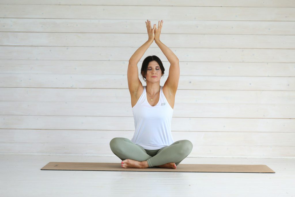 Inner and Outer Strength. Woman meditating in a yoga pose